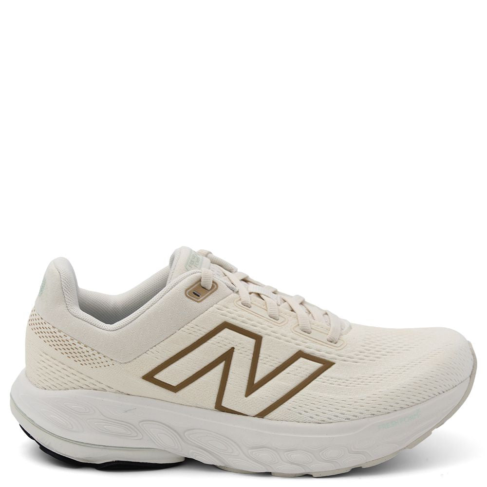 New Balance W860 V14 Women's Running Shoes  White running shoe with a brown logo 