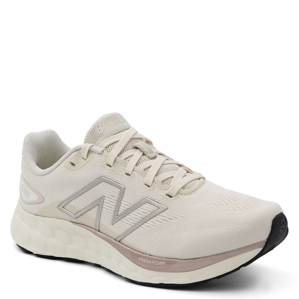 New Balance w680 V8 Women's Running Shoes Beige running shoe with New Balance logo 